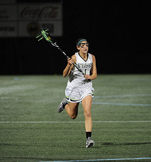 Carli Bafford charges up the field. (Photo by Sabina Moran)