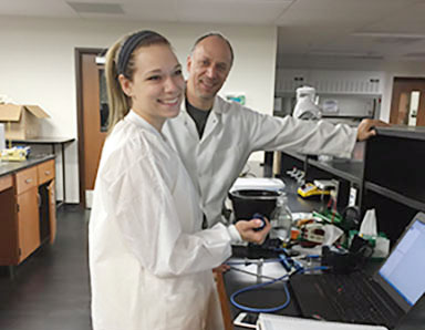 Students conduct cancer research
