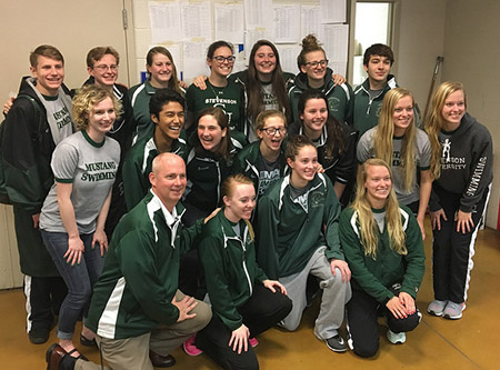 Swim team brings home nine medals