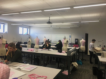 Students in the Fashion Design program are working hard in the studio. (Photo by Lauren Weaver)