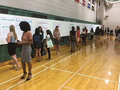Students showcasing their internships. Photo from Stevenson website.