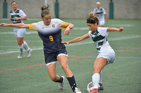 Sophomore, Allison Arters controls the ball in their contest against St. Marys College of Maryland. (Photo by Sabina Moran)