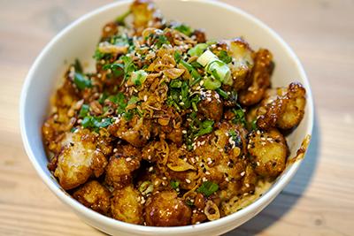 Stall 11 of R House serves a Korean barbecue cauliflower bowl. (Photo by Wornden Ly)
