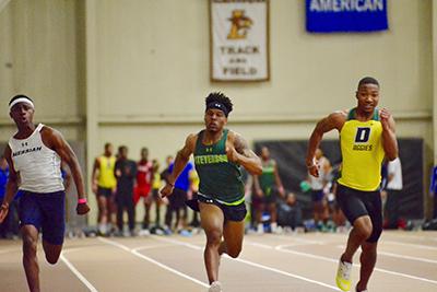 Morgan Cheatham sprints to the finish line during the 2018 MAC Indoor Championships. (Photo from Flickr)