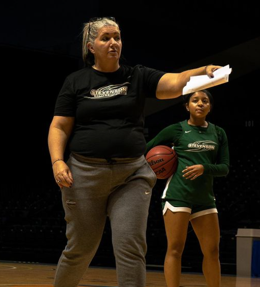 Head coach Jackie Boswell directs her team during a practice.