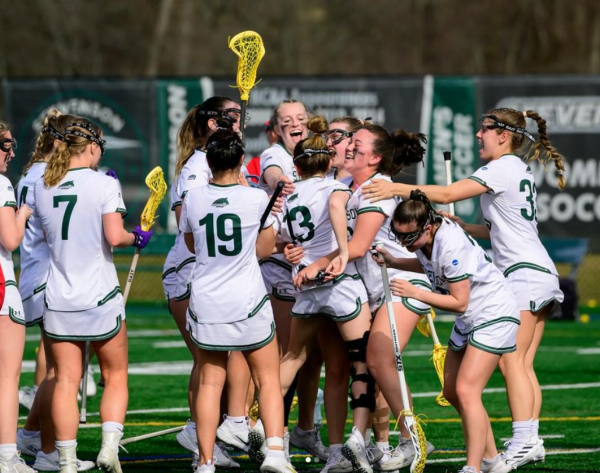 Womens lacrosse celebrating after beating Maritime 20-10 winning their fourth in last five. 