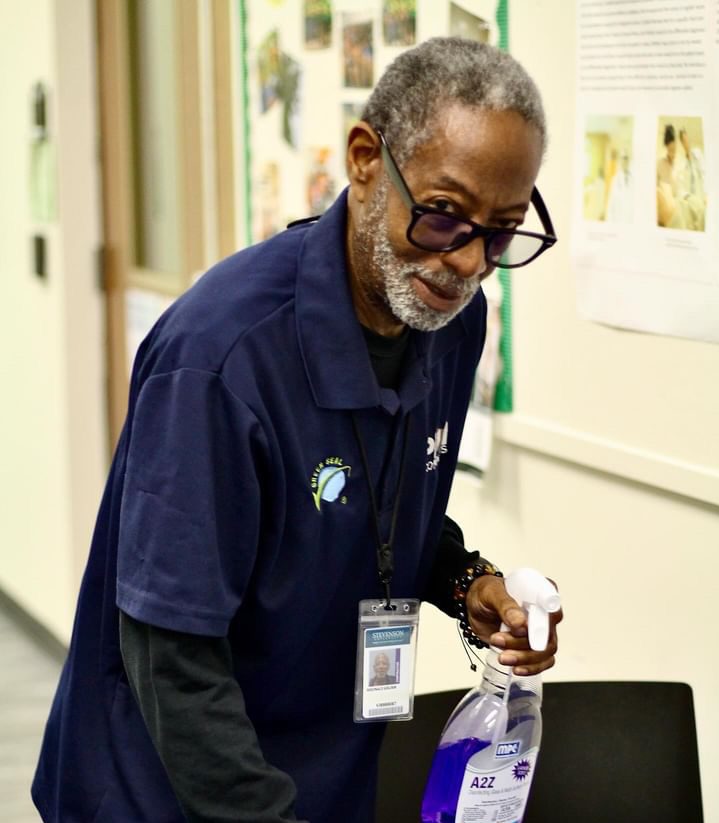 Two years after retiring, Reginald Golder strives to keep himself busy by keeping the cafeteria clean. My doctor told me to stay active, so I’ve found this is like physical therapy for me, Golder said.