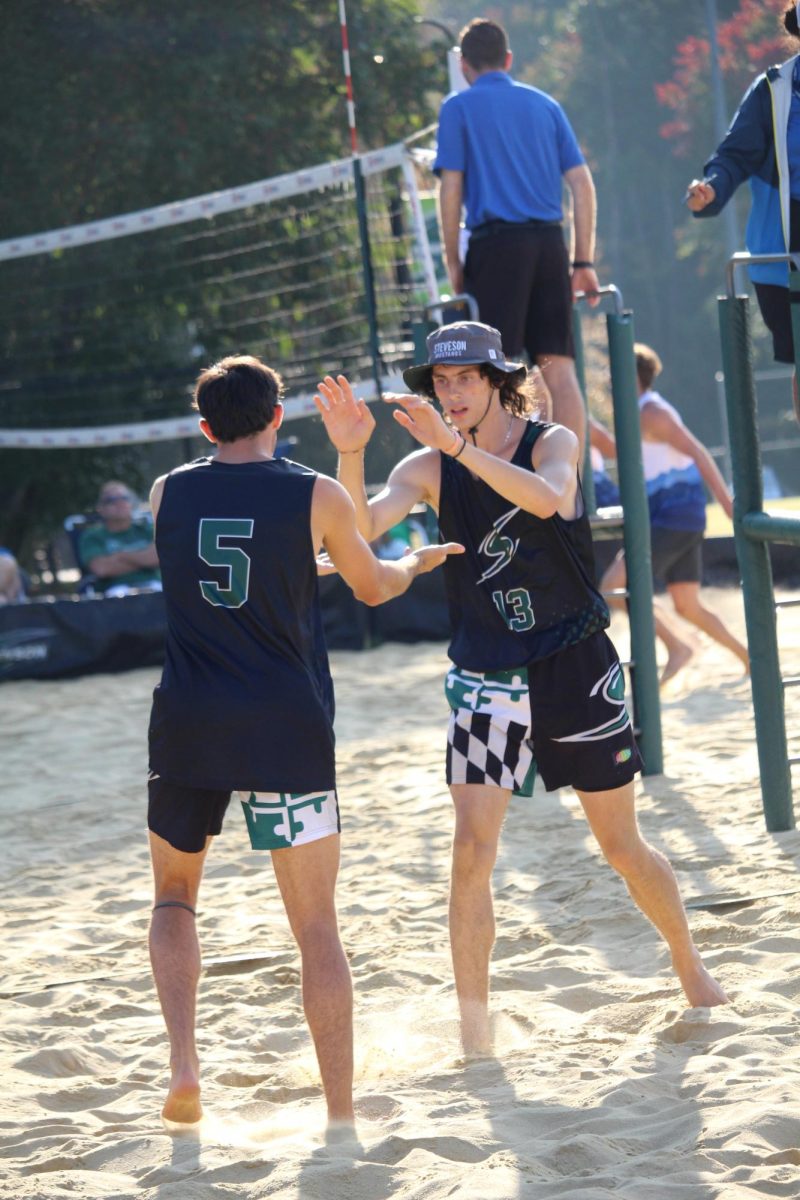 Pezzino and Thenell celebrate a won point in their semi-final game against LMU