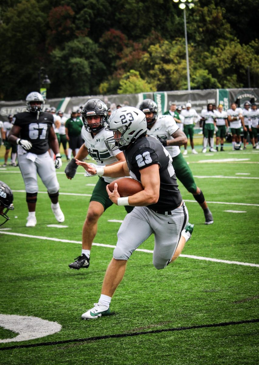 First year standout LJ Blackwell runs hard for the endzone.