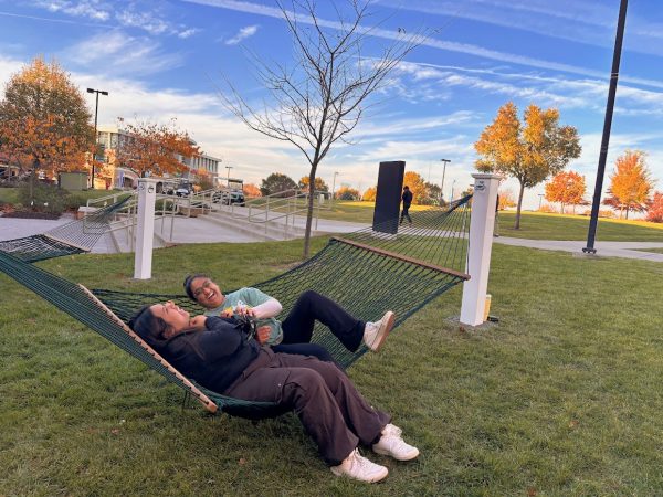 Second-years Samina Dhani and Shariemel Abellanosa enjoy the hammocks installed outside the Garrison South building. "I am really satisfied with the hammocks because it gives me a place where I can take a break from studying," Dhani said.