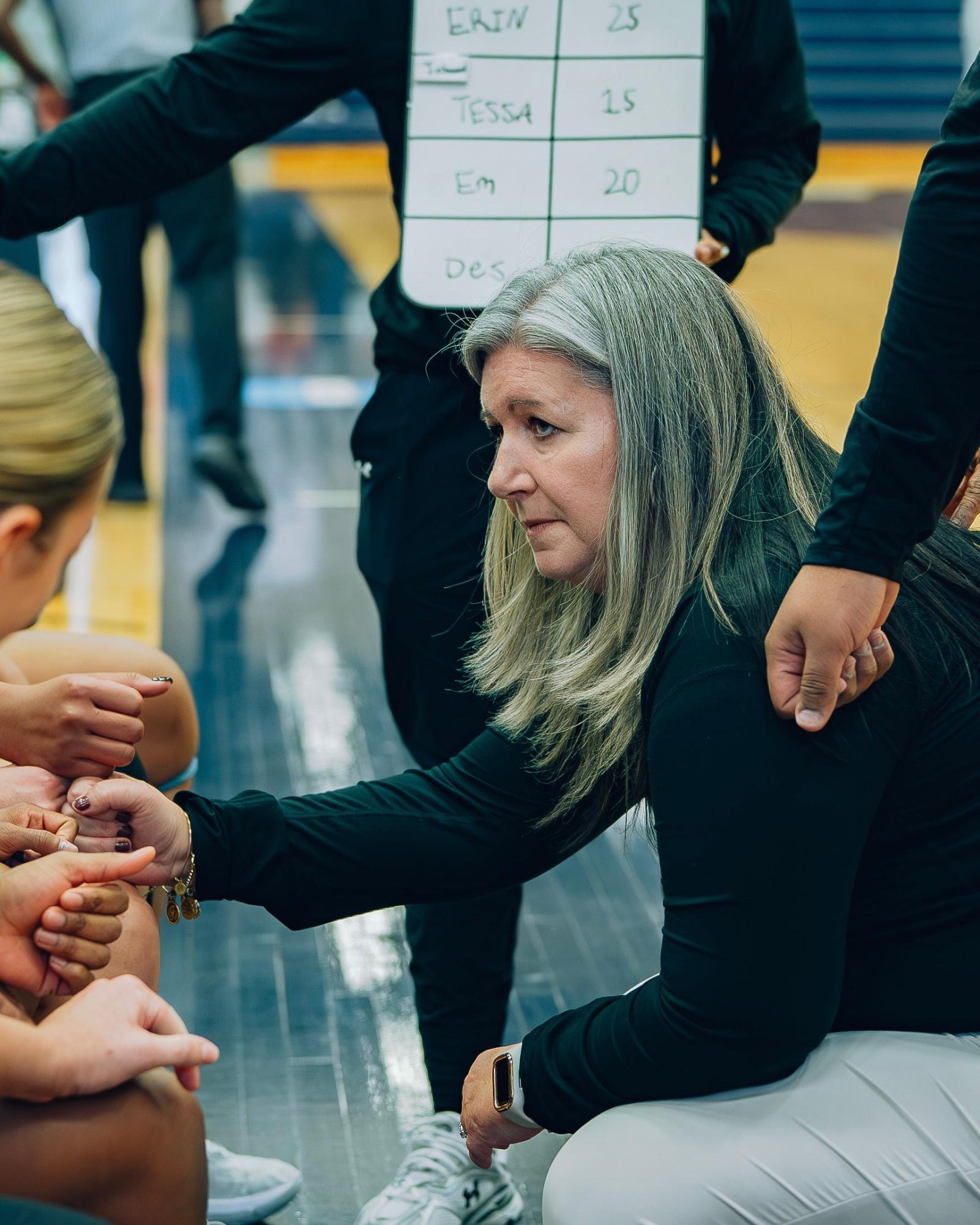Jackie Boswell recently retired as the head coach for the women's basketball team. She spearheaded the National Girls & Women in Sports Day celebration.
