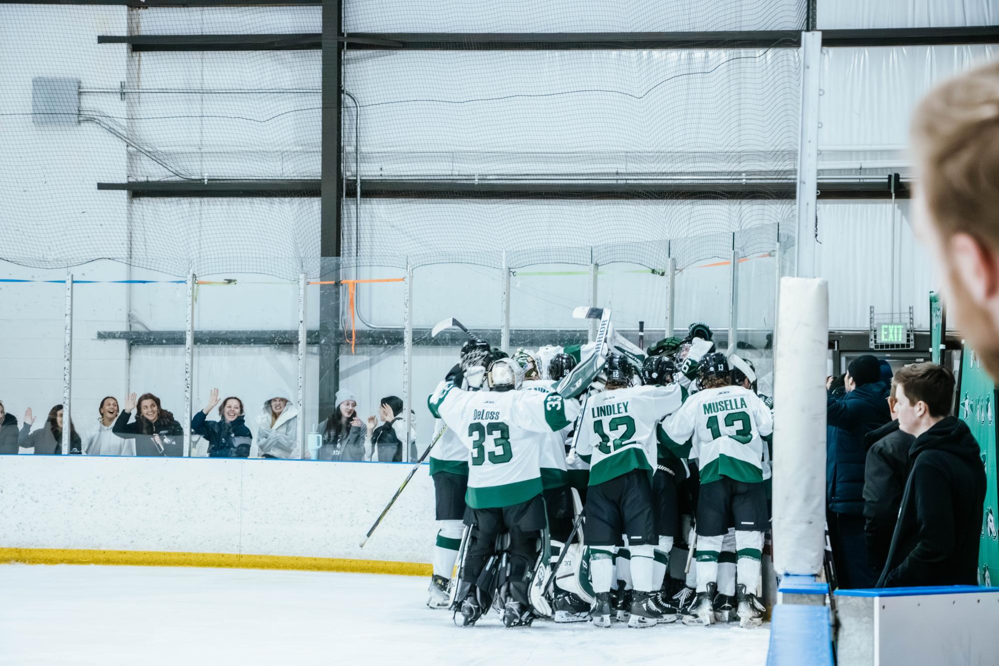 Stevenson's Men's Ice Hockey team celebrates as they advance to MAC Championship game defeating Neumann 2-1 in overtime. 