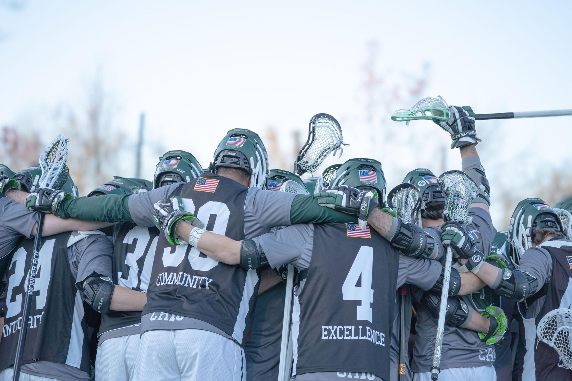 Men's lacrosse huddles during warm-ups prior to their 17-6 win against MAC opponent Hood. 