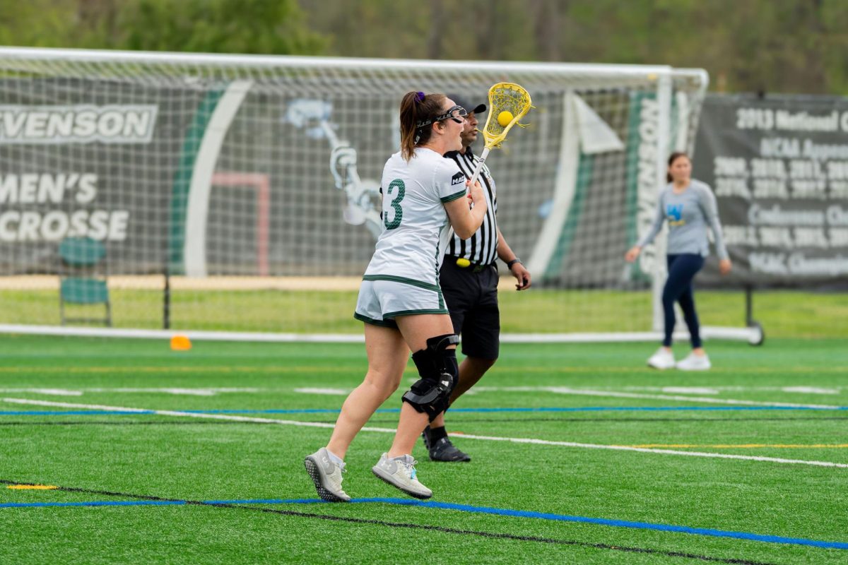 Senior Katherine Freidman running down the field