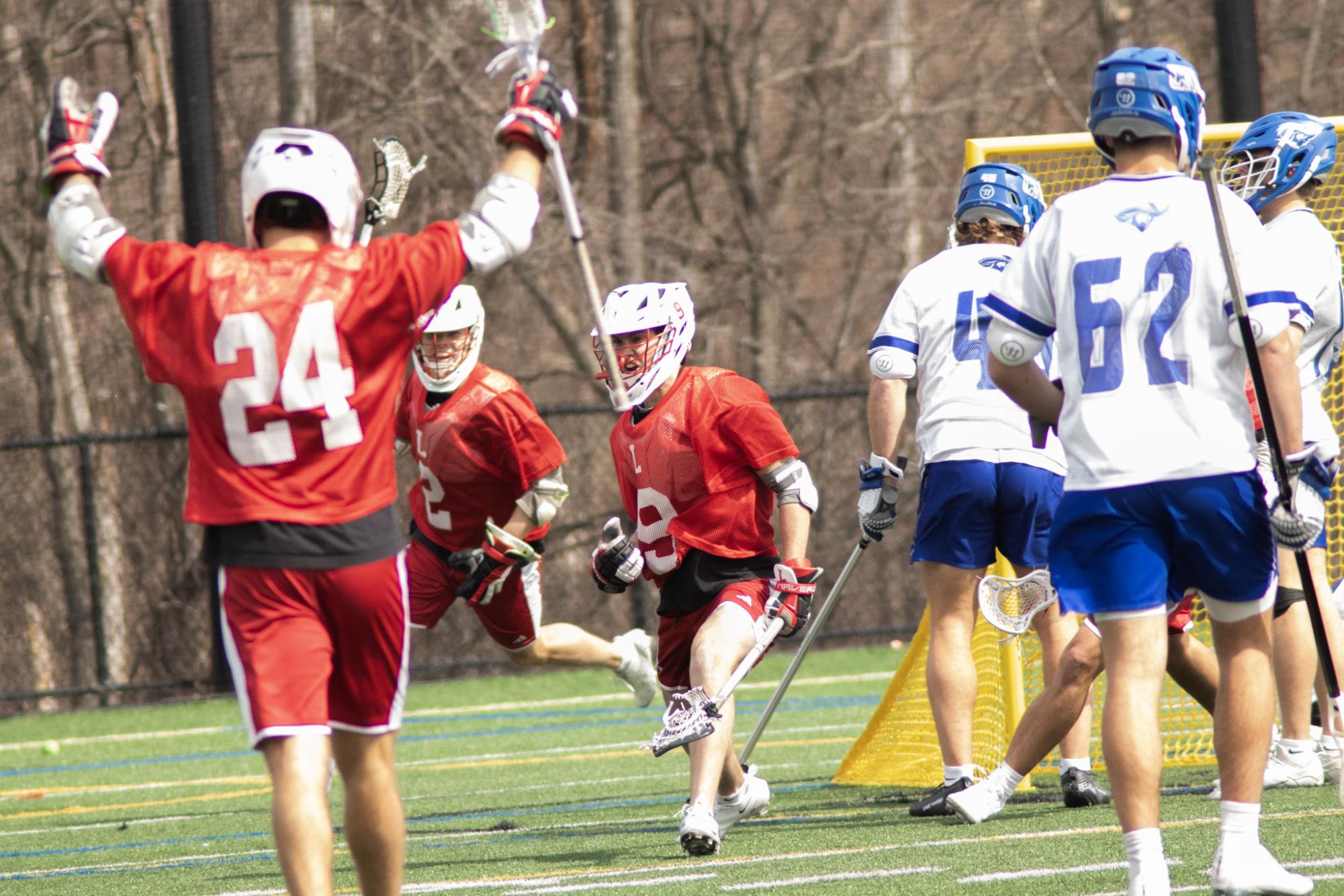 No. 4 Lynchburg players celebrate after scoring in their thrilling 22-21 win against No. 2 Christopher Newport 